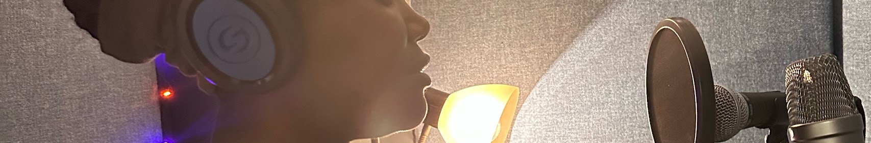 Sharon Mbungu Akinseye recording in the studio